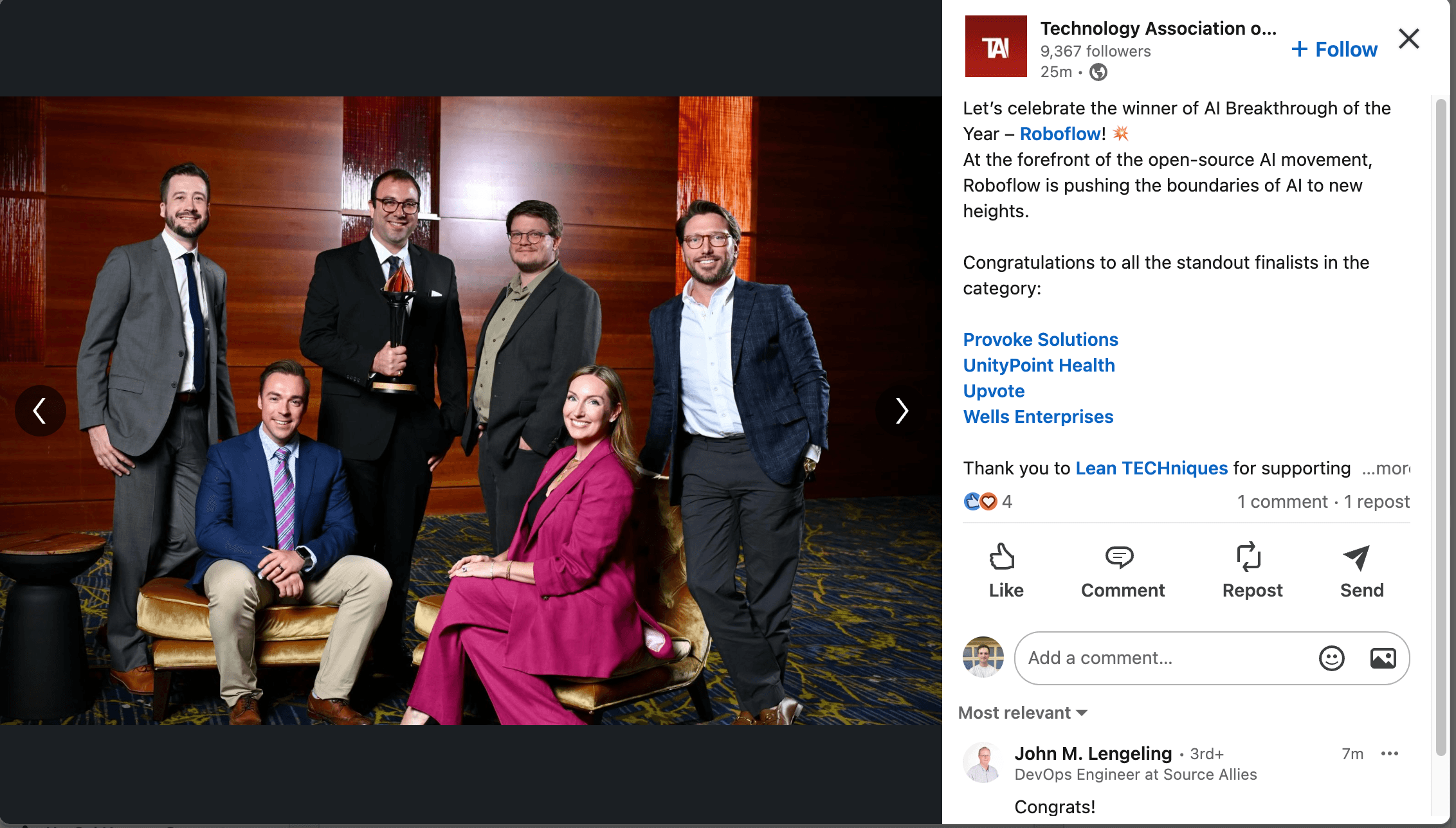 Roboflow teammates accepting an AI Breakthrough of the Year award